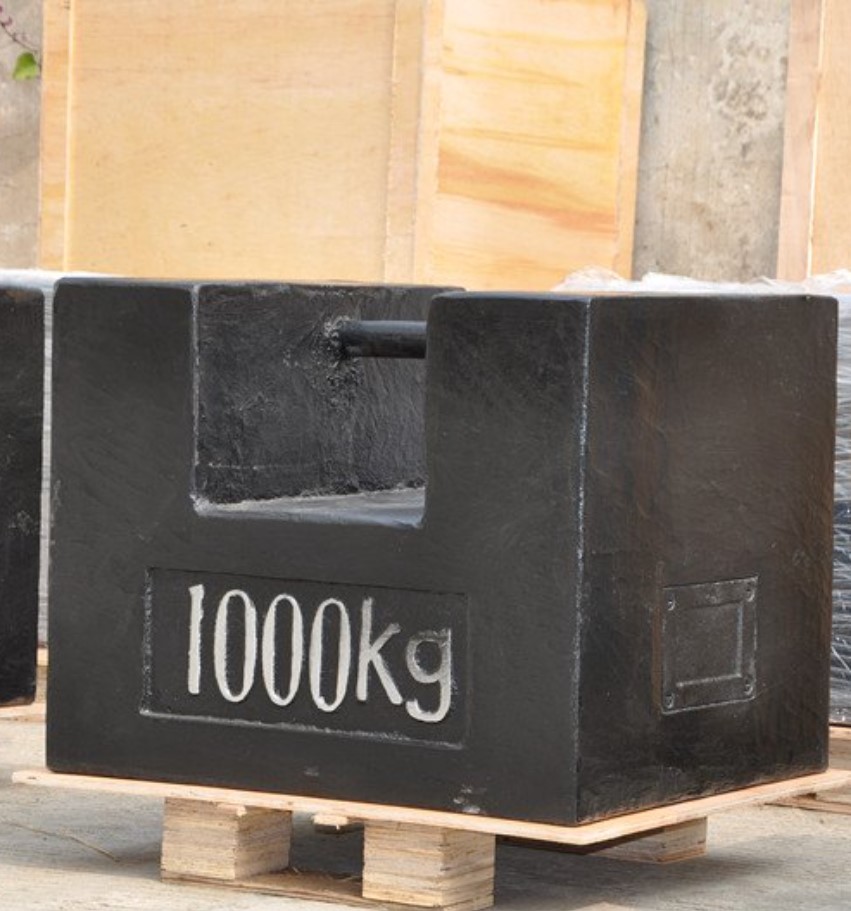 A metal 1000kg weight.